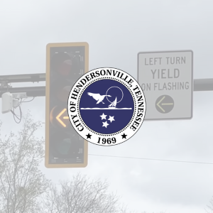 An image of a yellow flashing light with the city seal overlayed.